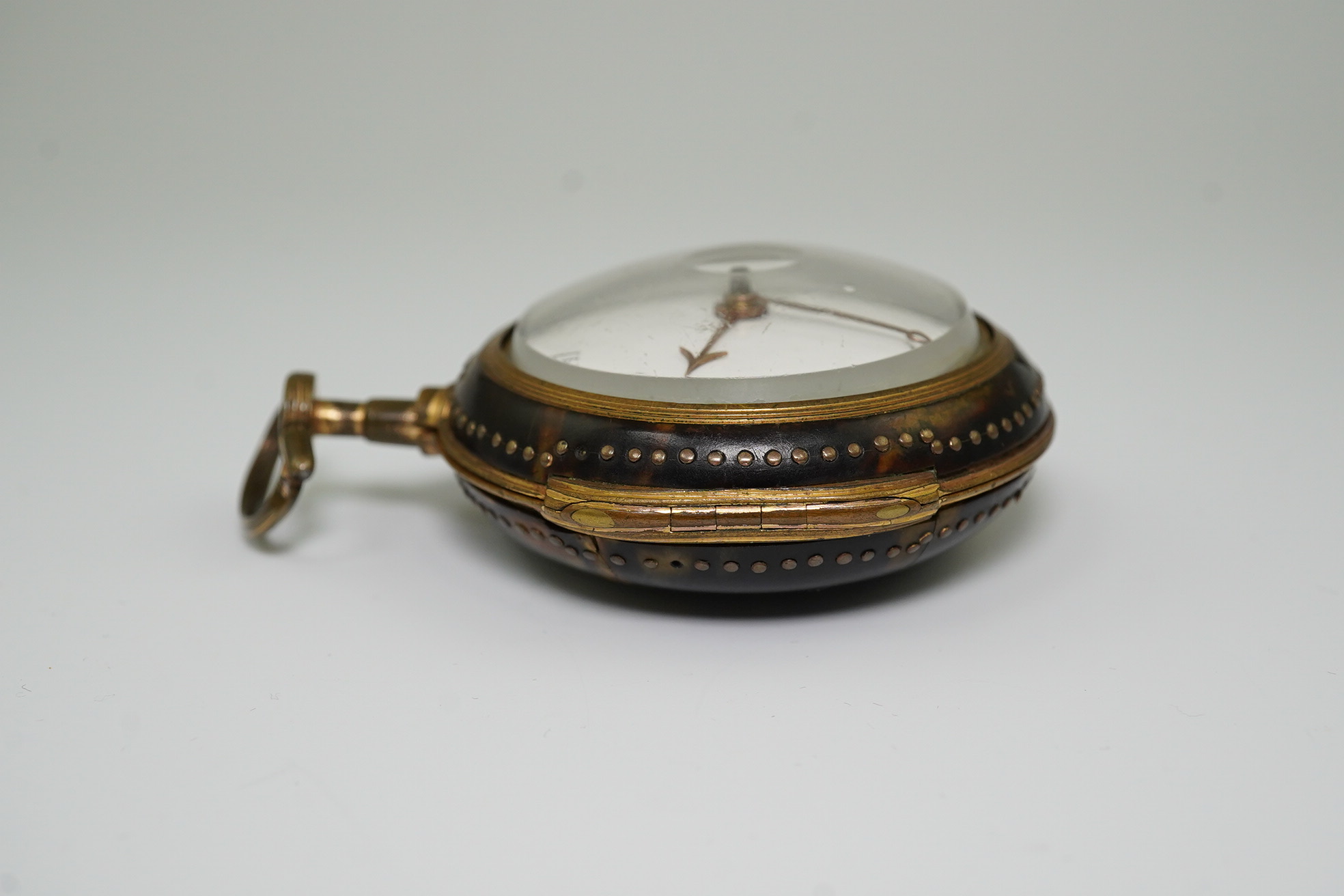 A George III pair cased gold plated keywind verge pocket watch, with a tortoiseshell outer case, by John Rentnow, London